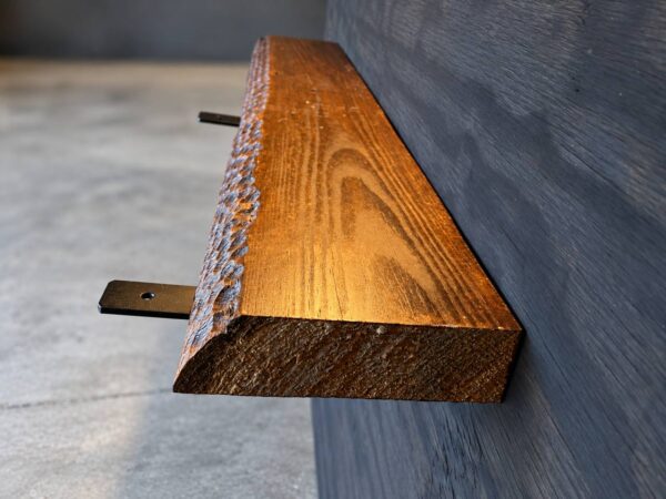 Pine live edge shelf SH-001 showing its sanded coated surface and natural wood edge