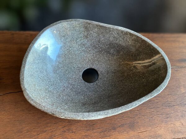 River stone vessel sink RSC-074 viewed from above, showing the basin and natural stone outline