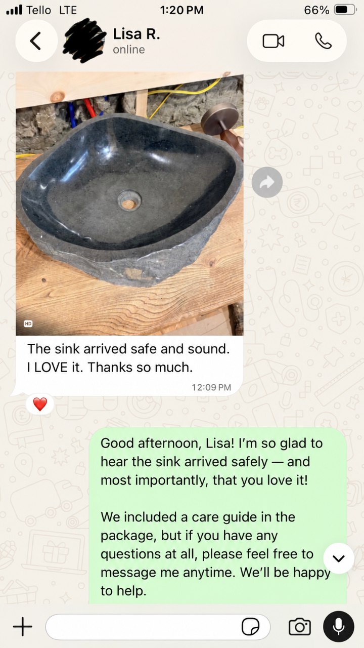 WhatsApp review from Lisa R. showing her river stone sink after delivery